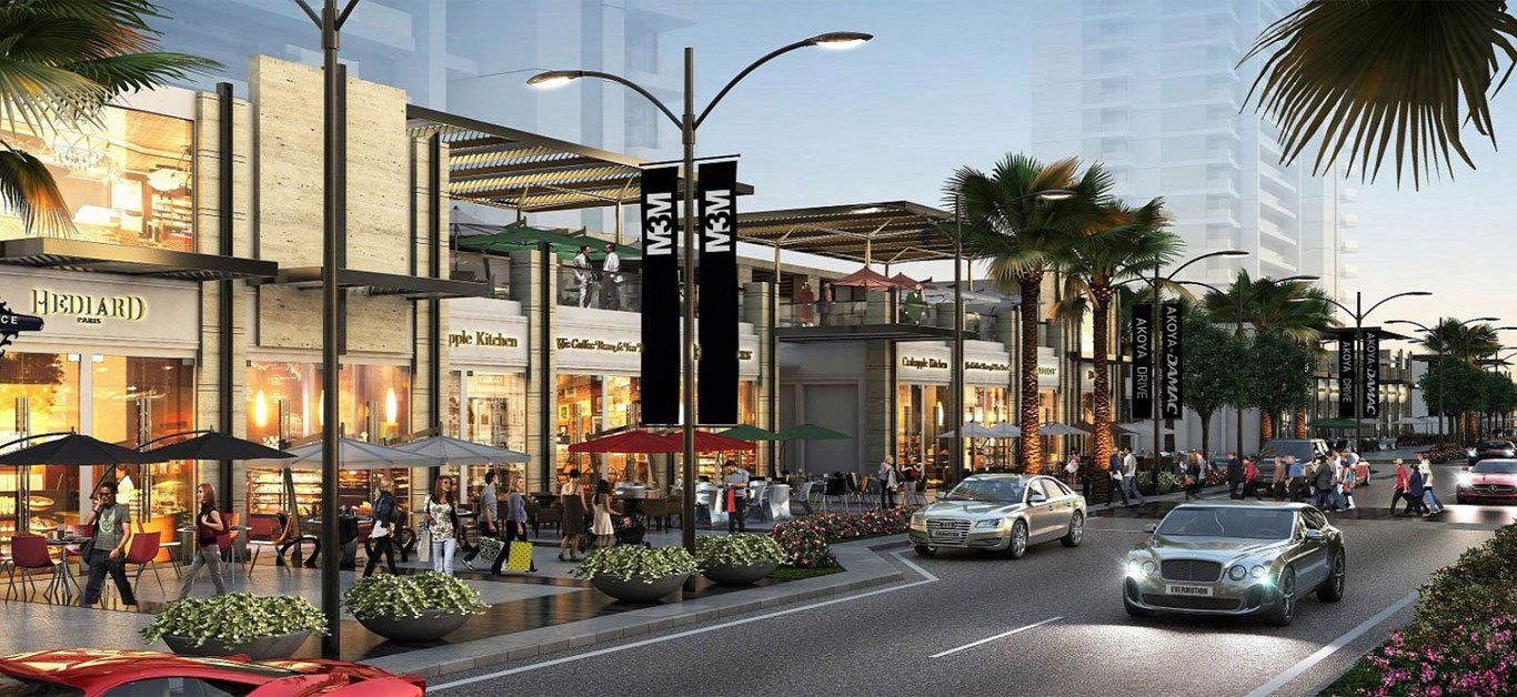 Modern shopping mall exterior with glass windows and signage for M3M SCO 113 Market_newlaunchdwarkaexpressway.com